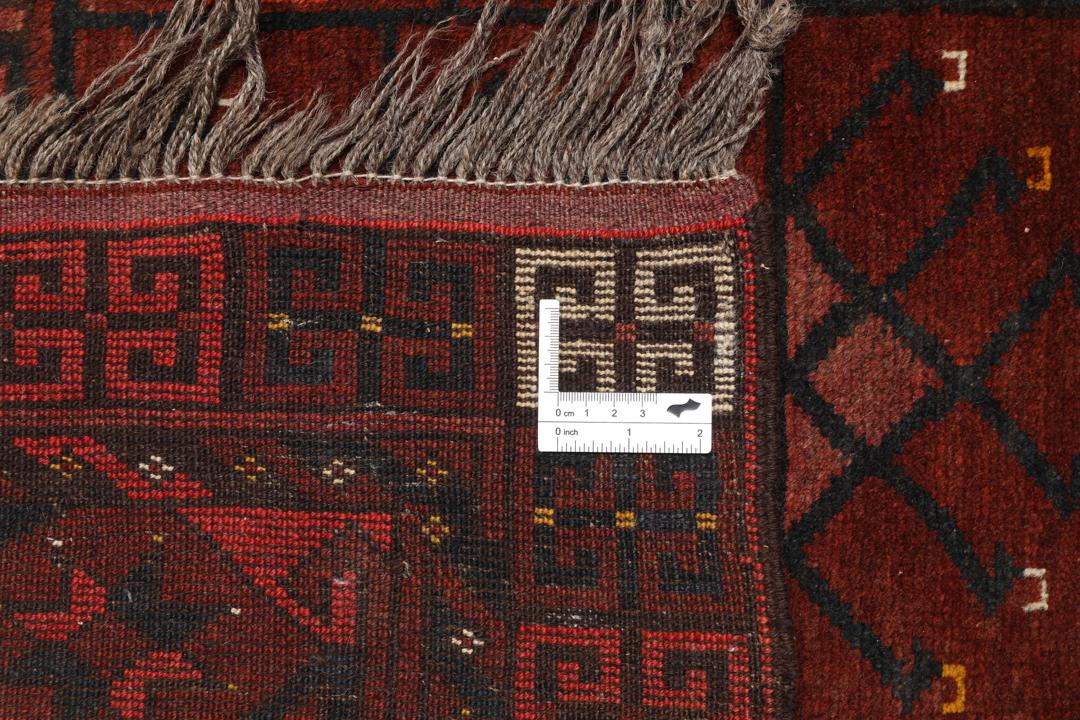 Tapis Afghan Khal Mohammadi noué à la main avec un motif géométrique rouge foncé et noir