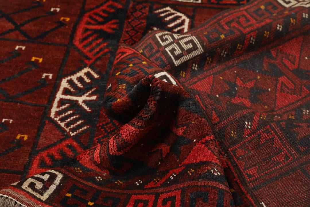 Tapis Afghan Khal Mohammadi noué à la main avec un motif géométrique rouge foncé et noir