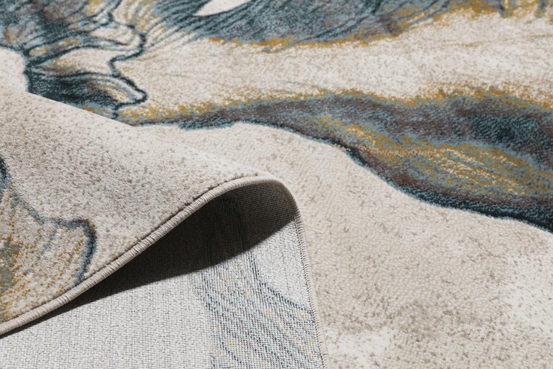 Beige vloerkleed met organisch bloemmotief