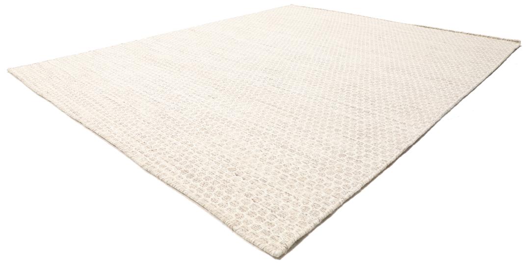 Beige handgeweven wollen tapijt met een subtiel honingraatpatroon