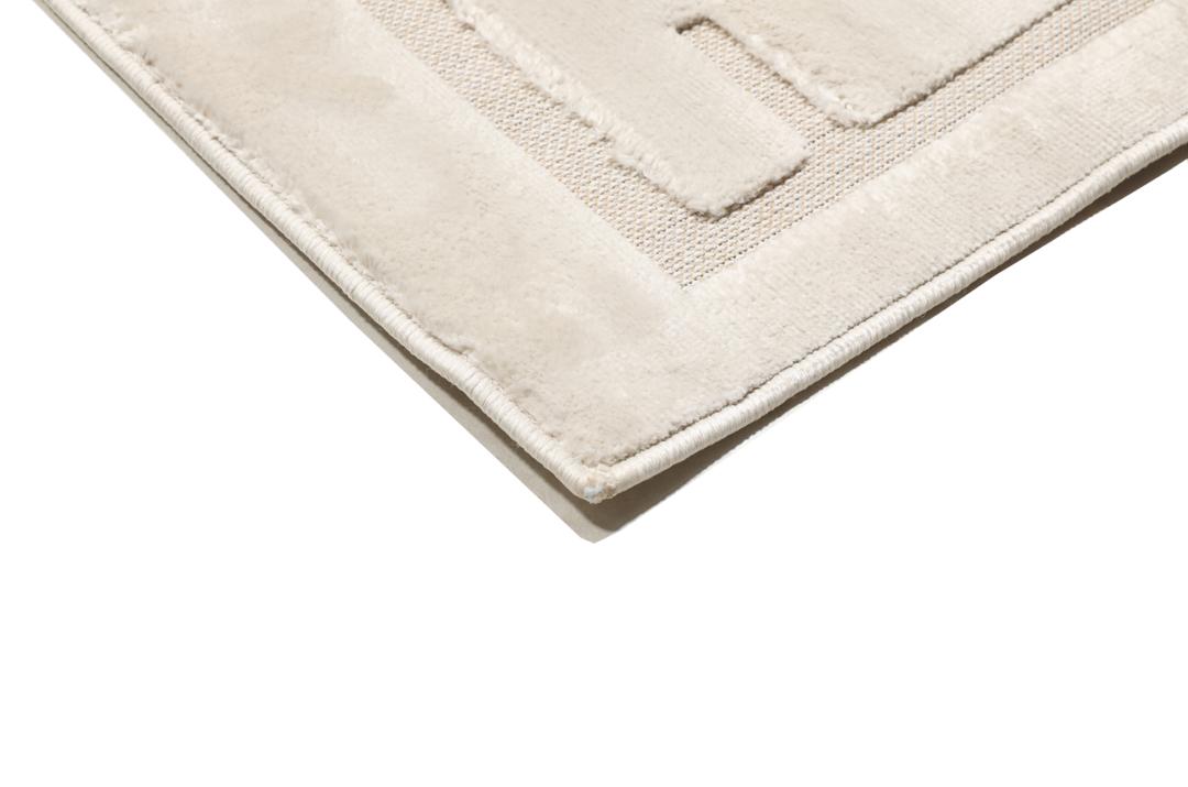Getextureerd crèmewit vloerkleed met hoog en laag poolpatroon