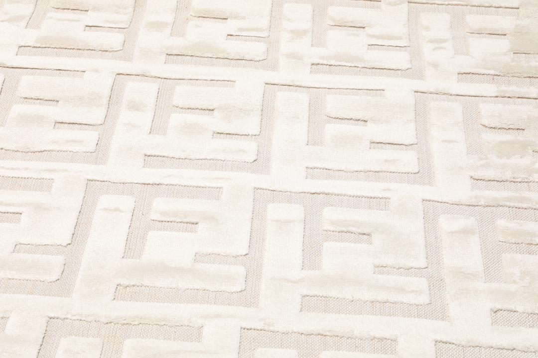 Getextureerd crèmewit vloerkleed met hoog en laag poolpatroon