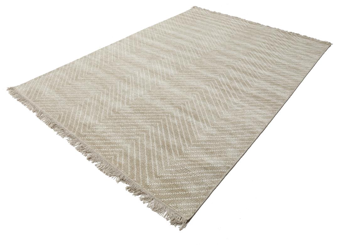 Beige rug with a chevron pattern
