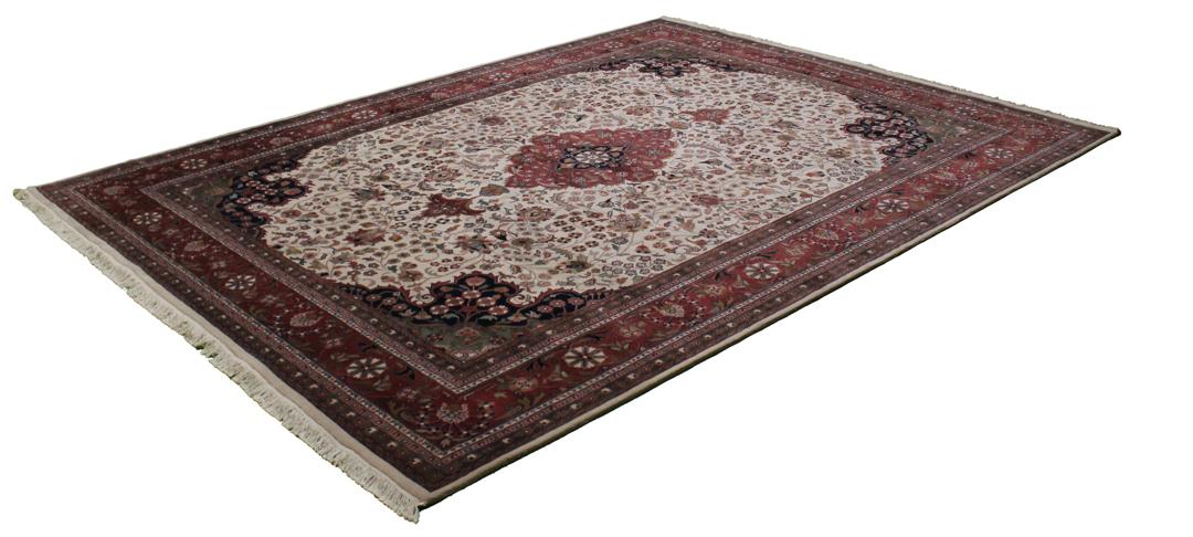 Hand-knotted Tabriz rug from India in red and beige tones
