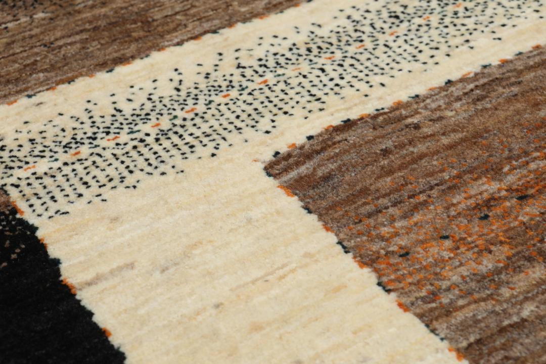 Håndknyttet Gabbeh Fine-tæppe fra Mellemøsten i brune og cremefarvede nuancer.