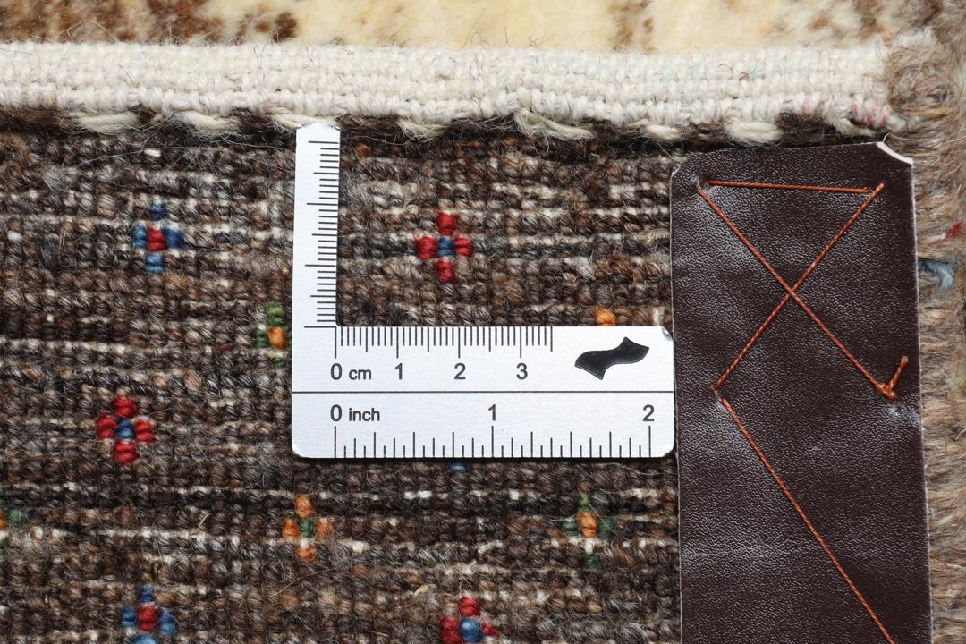 Handgeknoopt Gabbeh Fine vloerkleed met bloemmotieven en bruine strepen uit het Midden-Oosten