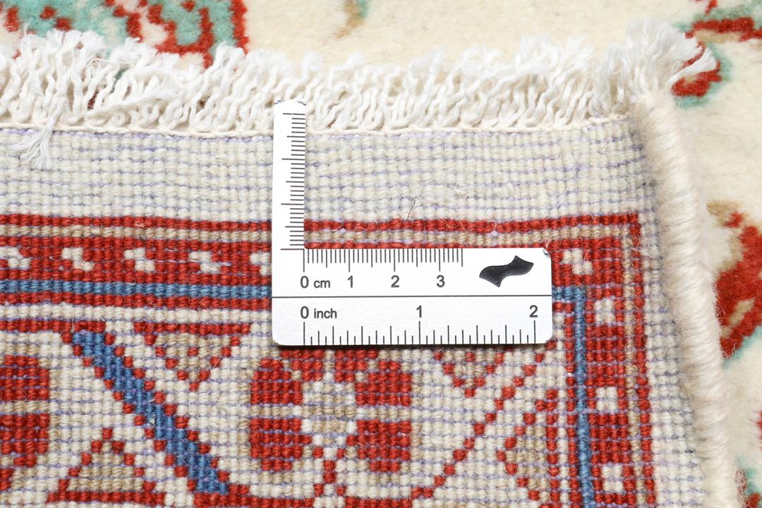 Handgeknoopt Sarough-tapijt met bloemmotieven in rood en blauw op een ivoorkleurige achtergrond