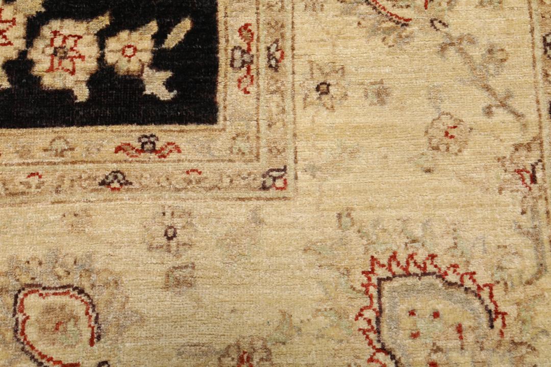 Hand-knotted Ziegler Fine rug from Pakistan with a black field and floral motifs