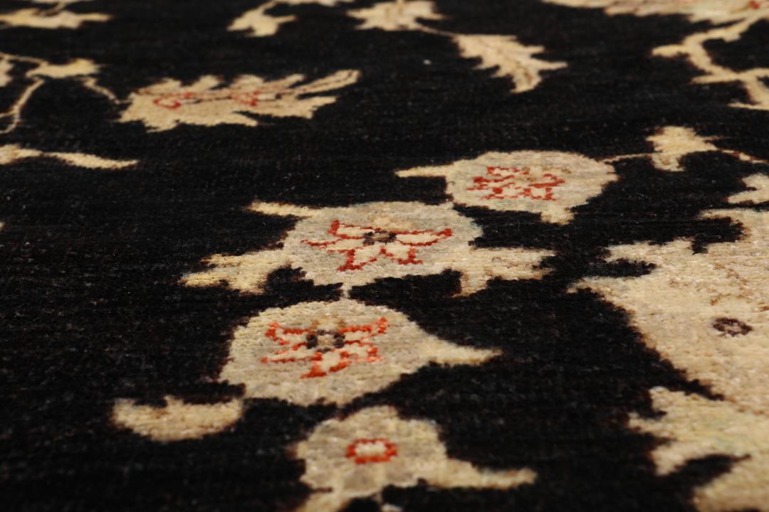 Hand-knotted Ziegler Fine rug from Pakistan with a black field and floral motifs