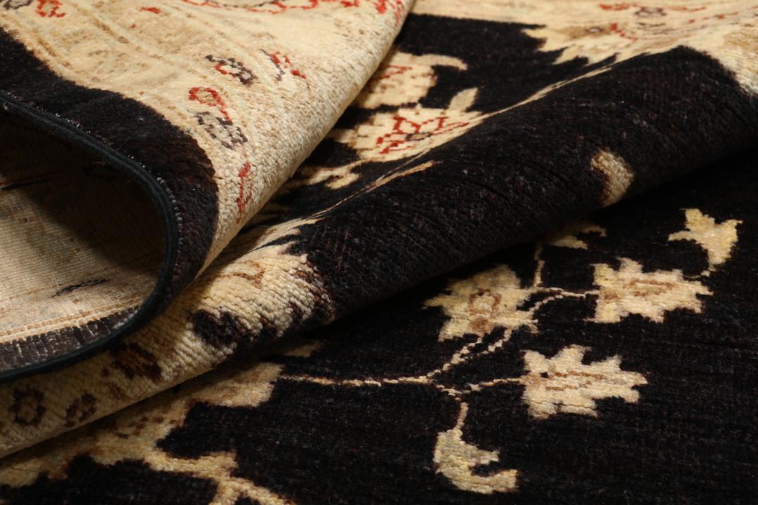 Hand-knotted Ziegler Fine rug from Pakistan with a black field and floral motifs