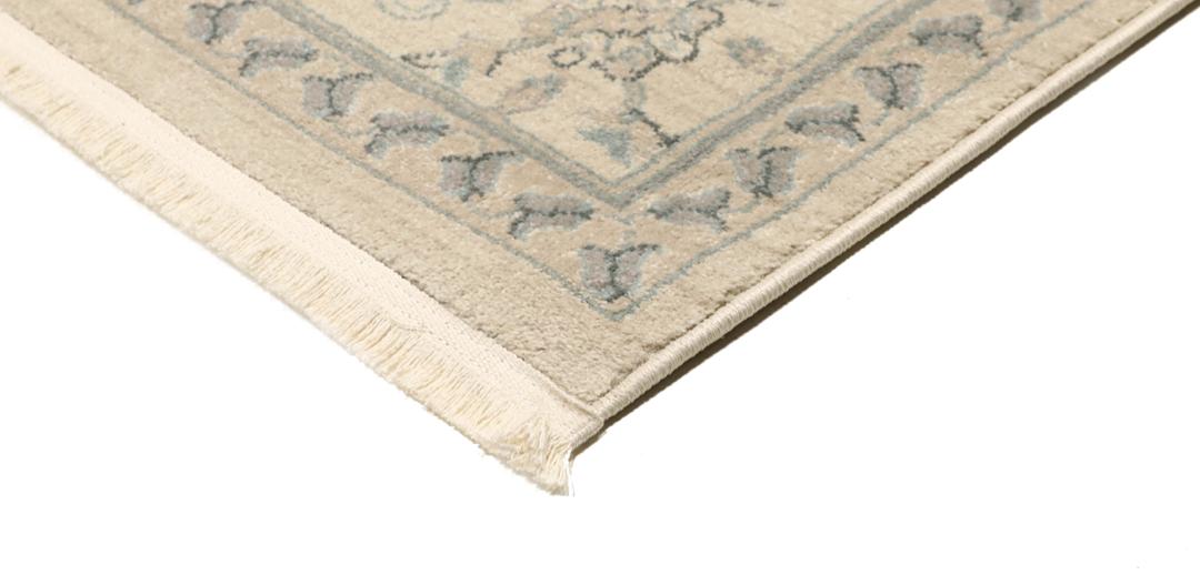 Beige tapijt met franje