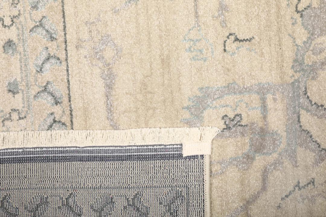 Beige tapijt met franje