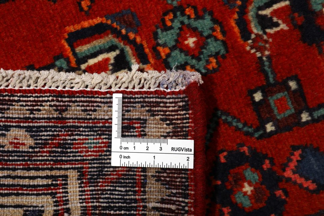 Håndknyttet Sarough-tæppe fra Mellemøsten i røde nuancer med indviklede motiver