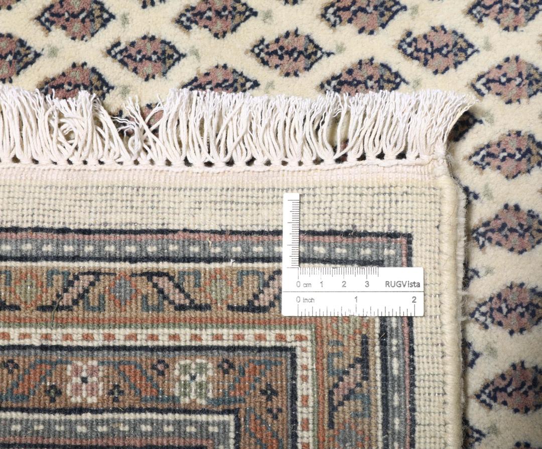 Håndknyttet Mir Indo-tæppe med et beige og brunt mønstret design fra Indien