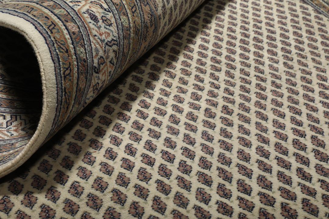 Håndknyttet Mir Indo-tæppe med et beige og brunt mønstret design fra Indien