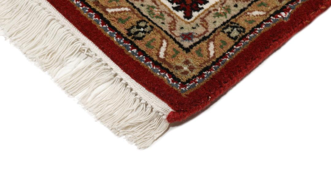 Tapis Tabriz noué à la main originaire d'Inde dans des tons rouges et beiges