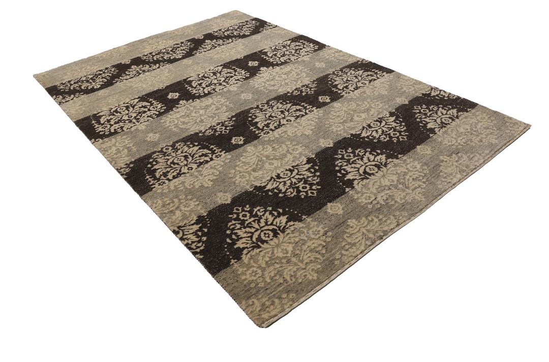 Handgeknoopt Gabbeh Loribaft-tapijt uit India in donkergrijze en beige tinten.