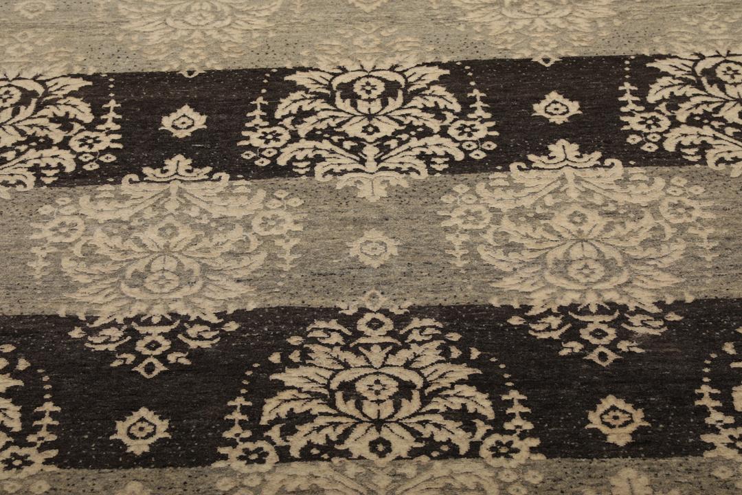 Handgeknoopt Gabbeh Loribaft-tapijt uit India in donkergrijze en beige tinten.