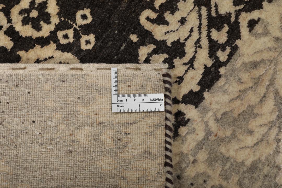 Handgeknoopt Gabbeh Loribaft-tapijt uit India in donkergrijze en beige tinten.