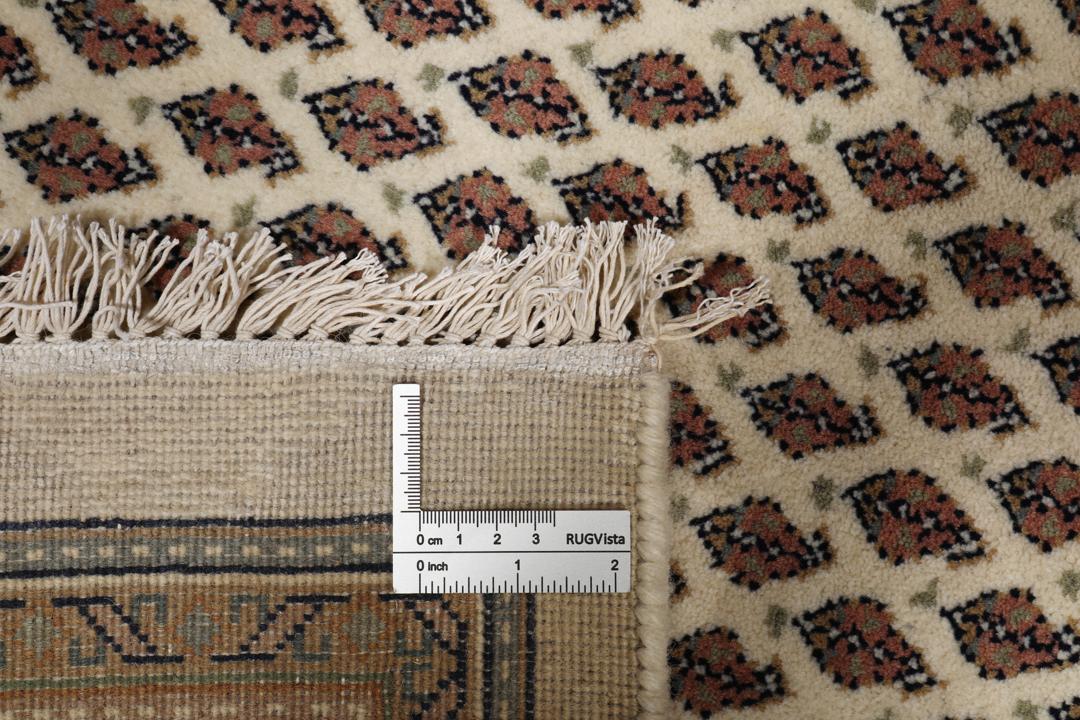 Tapis Mir Indo noué main venant d'Inde dans des tons beige et marron chaleureux.