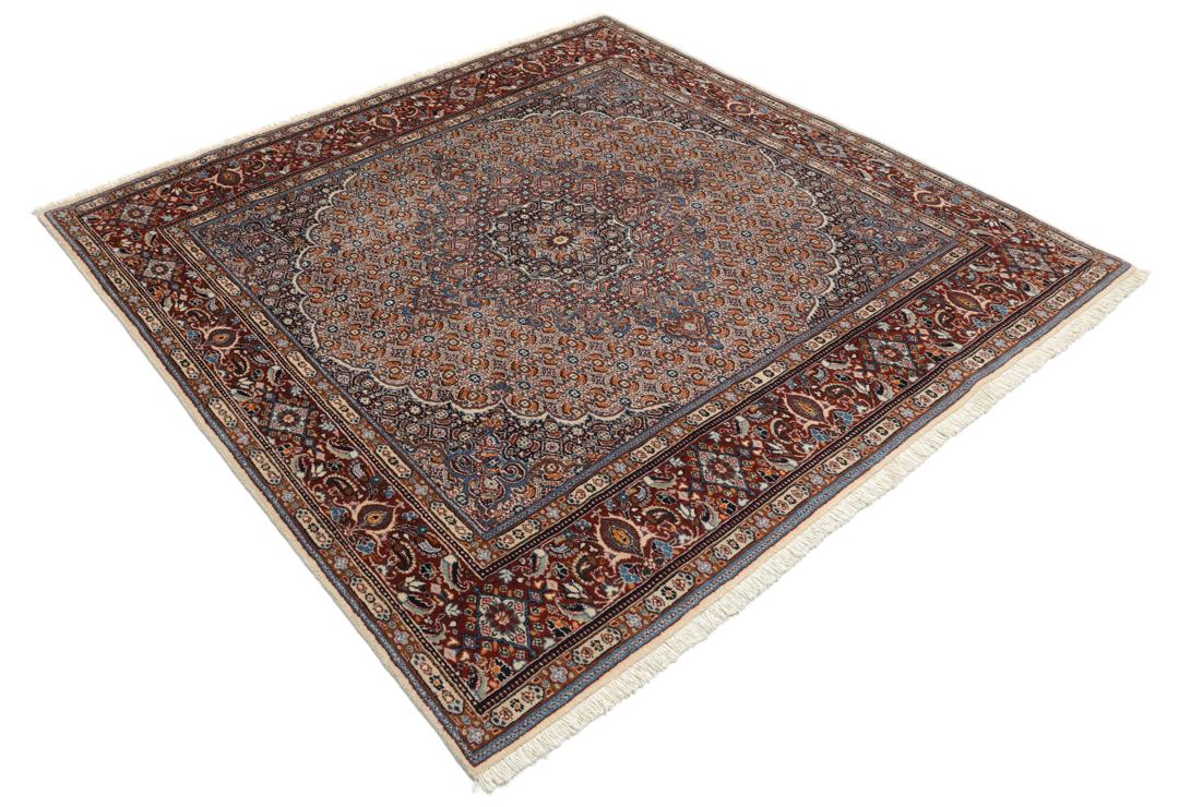 Hand-knotted Moud rug with a central medallion and ornate floral patterns in dark-red and blue