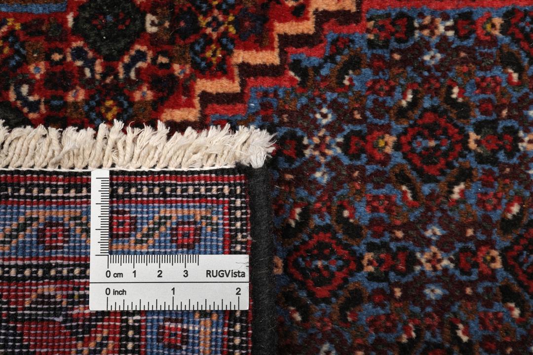 Håndknyttet Senneh-tæppe med et mørkerødt og blåt geometrisk design fra Mellemøsten