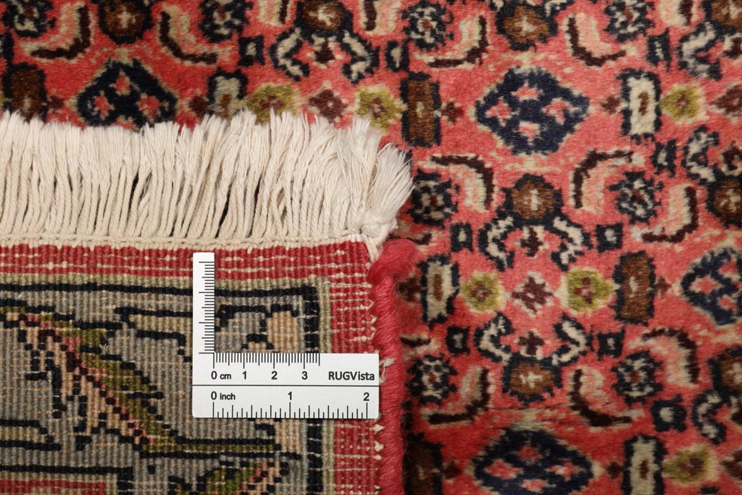 Handgeknoopt Senneh wollen tapijt uit het Midden-Oosten in multicolor tinten.