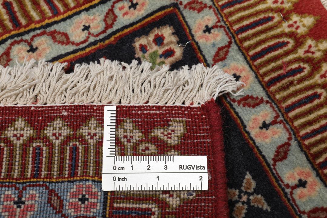 Handgeknoopt Kashmar tapijt uit het Midden-Oosten in donkerblauwe en rode tinten