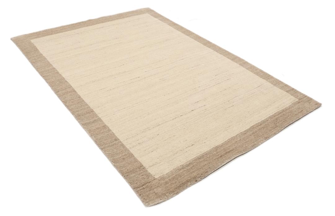 A rectangular rug in natural white and beige with a simple border design.
