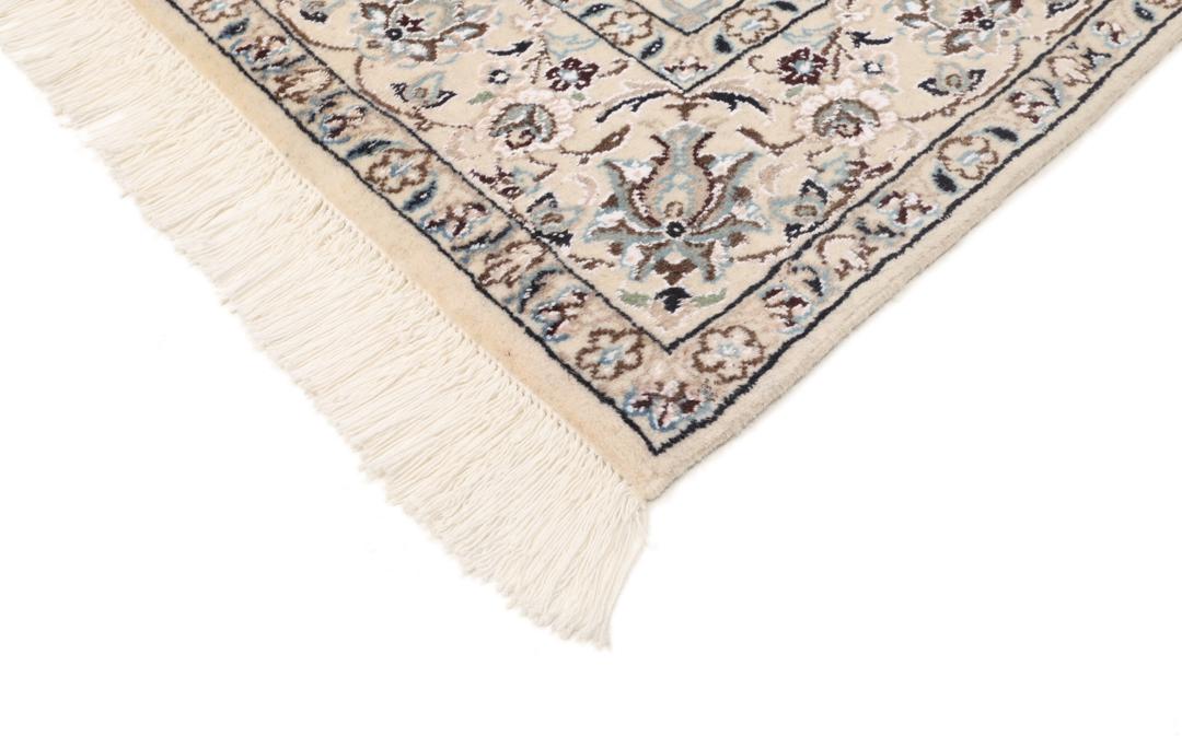 Hand-knotted Nain Fine 9La wool rug from the Middle East in red and beige tones