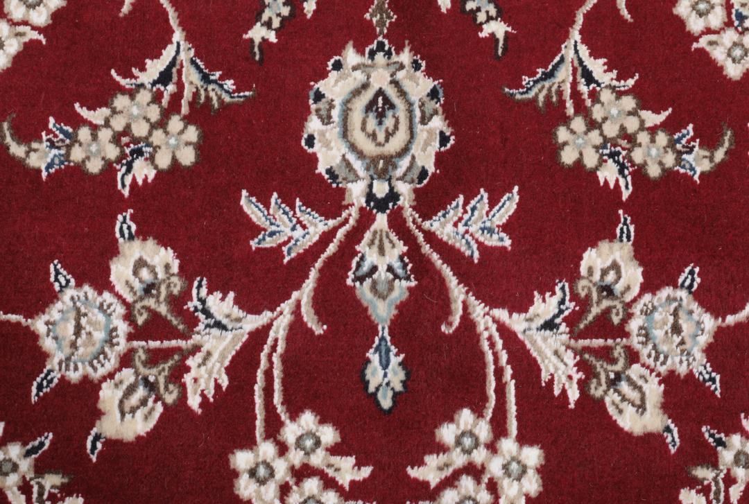 Hand-knotted Nain Fine 9La wool rug from the Middle East in red and beige tones