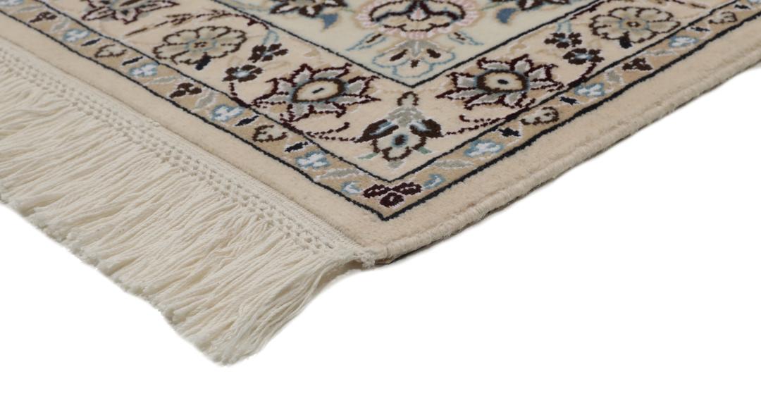 Hand-knotted Nain rug from the Middle East in blue and beige