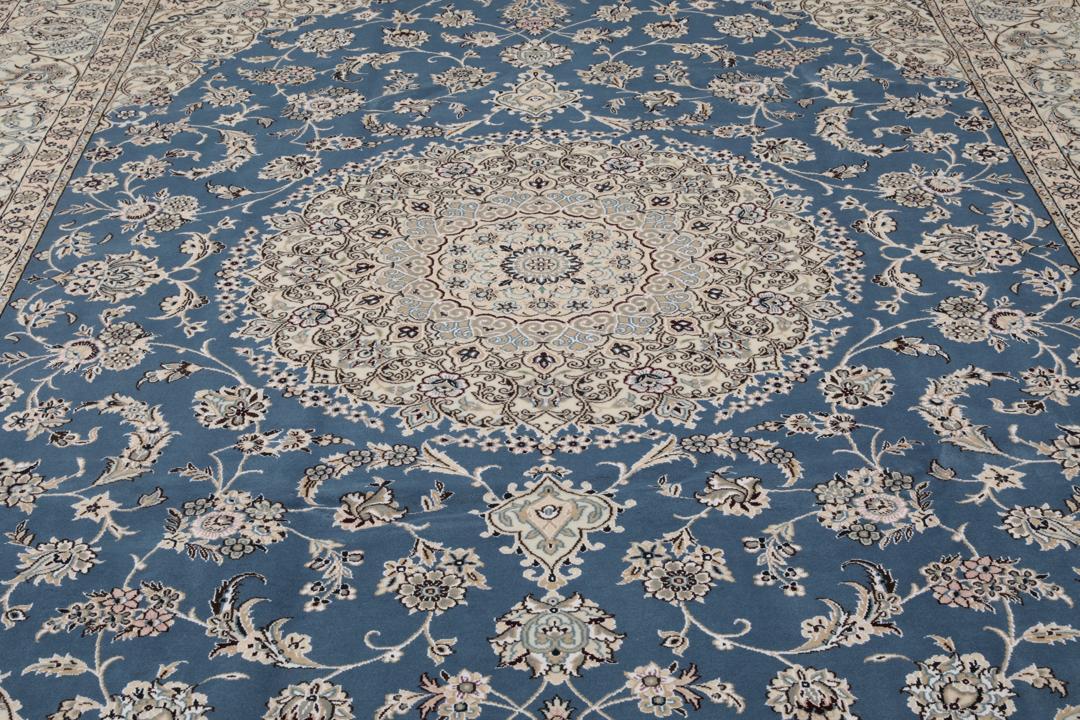 Hand-knotted Nain rug from the Middle East in blue and beige