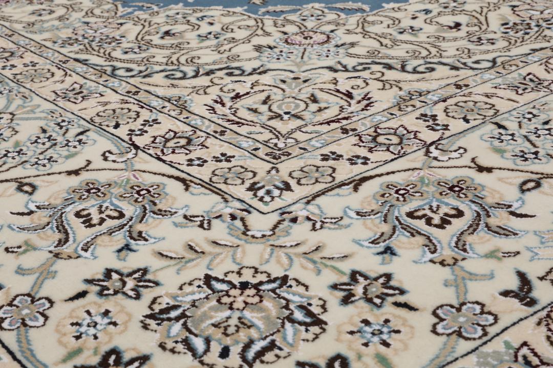 Hand-knotted Nain rug from the Middle East in blue and beige
