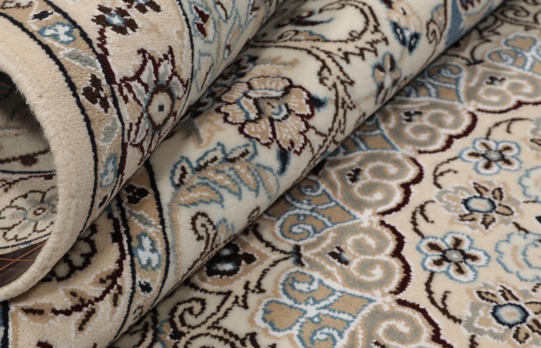 Hand-knotted Nain rug from the Middle East in blue and beige