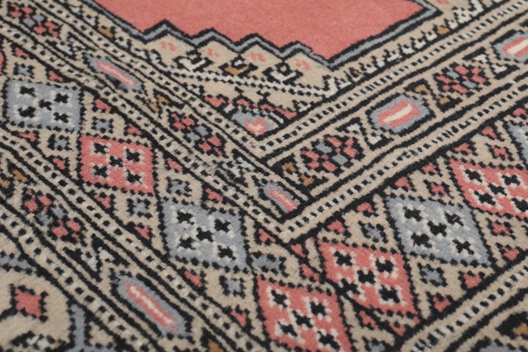 Hand-knotted Pakistan Bokhara 2ply rug in red with medallion motifs