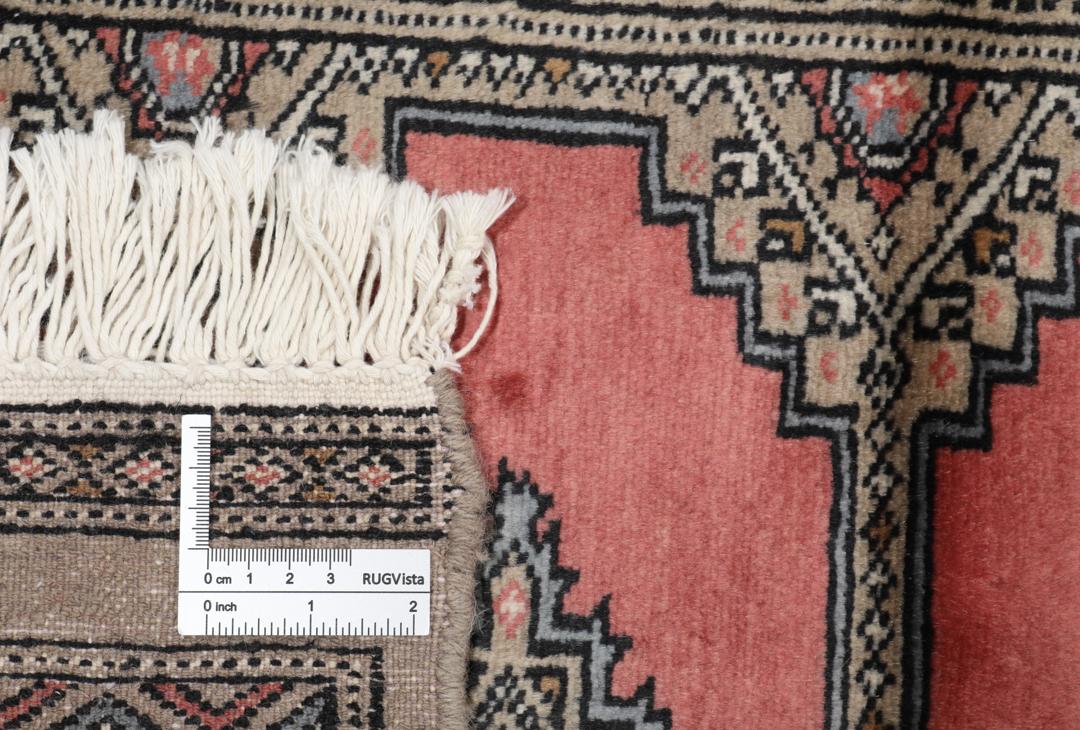 Hand-knotted Pakistan Bokhara 2ply rug in red with medallion motifs