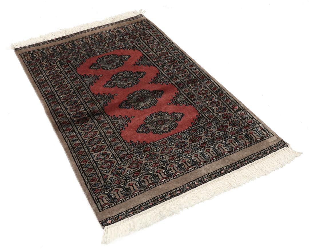 Hand-knotted Pakistan Bokhara rug with a red and beige geometric pattern