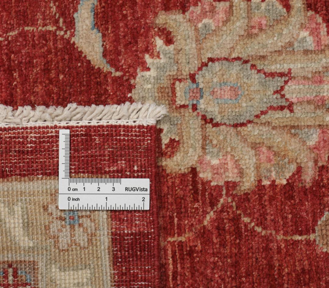 Hand-knotted Afghan rug with floral motifs in dark-red and beige