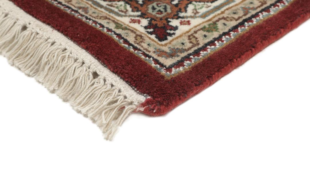 Ręcznie wiązany dywan Tabriz Royal z Indii w kolorach ciemnoczerwonym i beżowym.