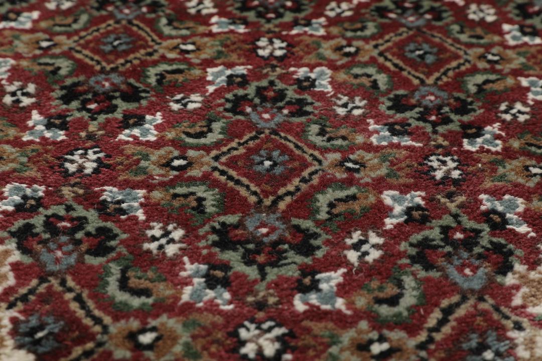 Ręcznie wiązany dywan Tabriz Royal z Indii w kolorach ciemnoczerwonym i beżowym.