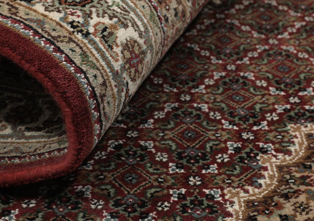 Ręcznie wiązany dywan Tabriz Royal z Indii w kolorach ciemnoczerwonym i beżowym.