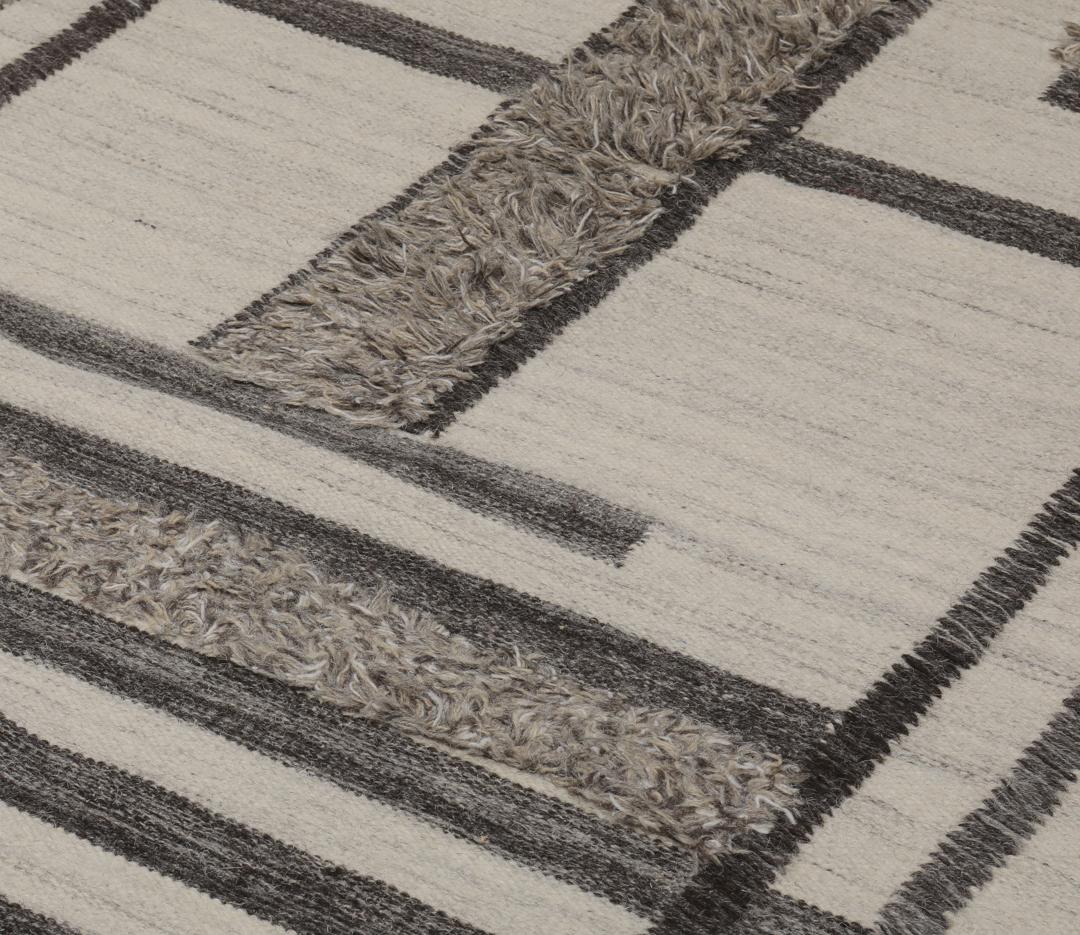 beige uldtæppe