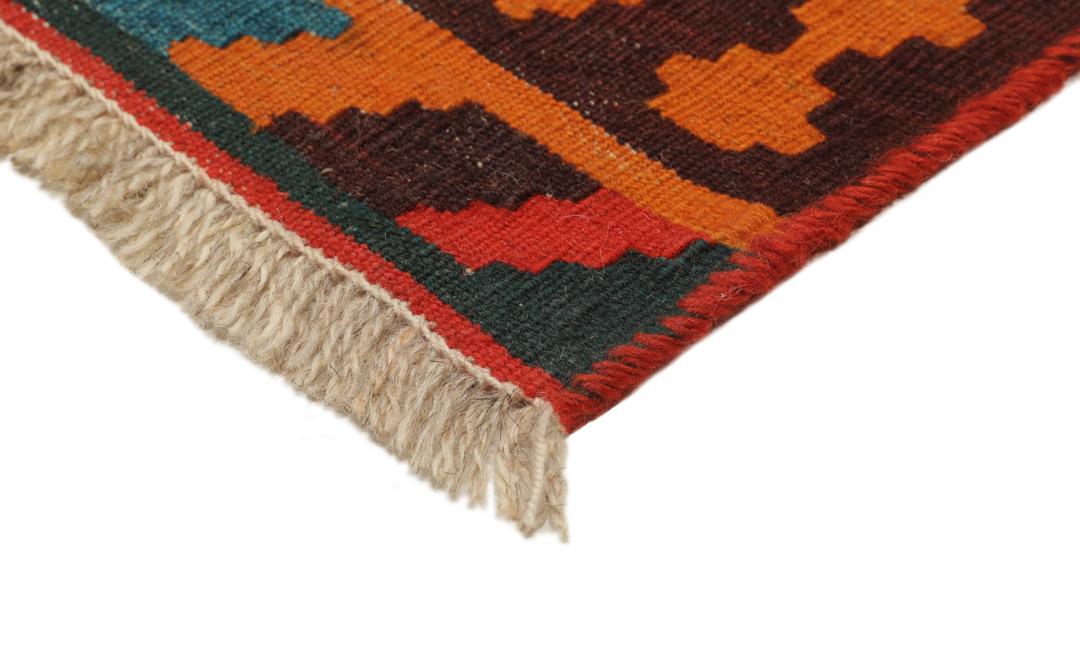 Handgeweven vintage kelim uit het Midden-Oosten in levendig rood met geometrische patronen