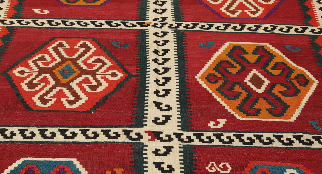 Handgeweven vintage kelim uit het Midden-Oosten in levendig rood met geometrische patronen