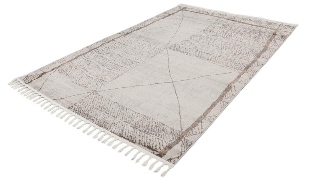 Beige en taupe vloerkleed met geometrische patronen