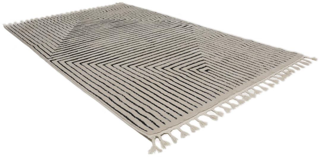 Cream white rug with black geometric lines and fringe