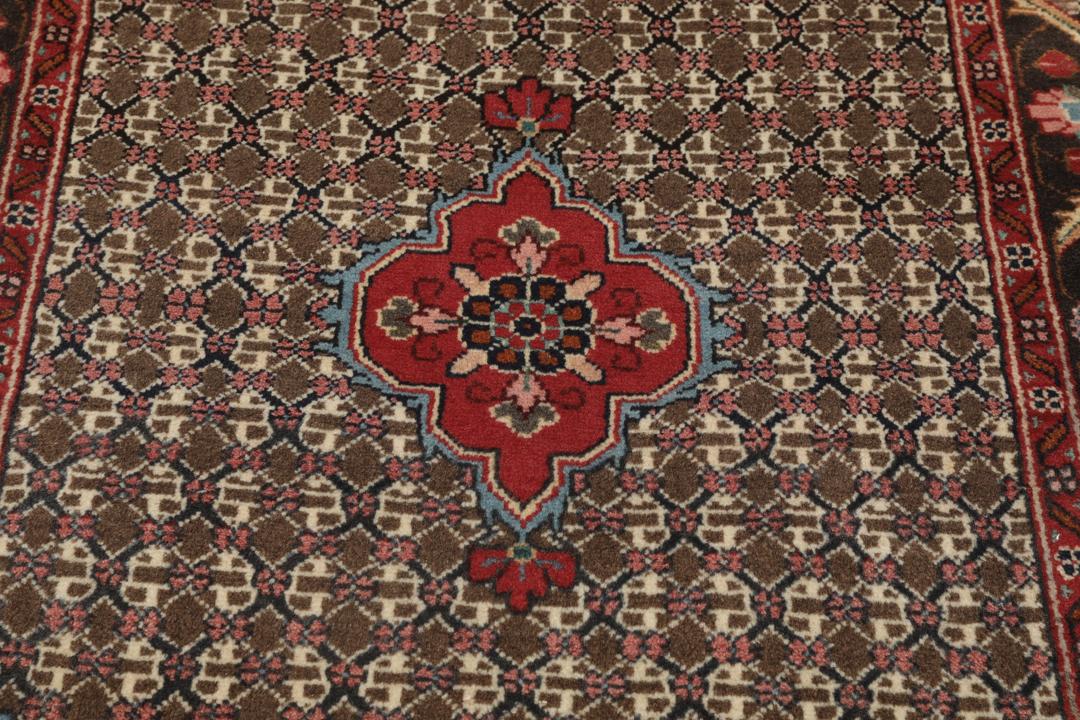 Hand-knotted Koliai rug from the Middle East with a multicolor geometric pattern