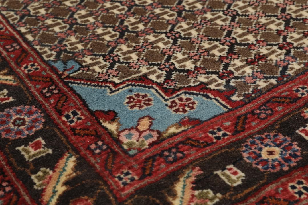 Hand-knotted Koliai rug from the Middle East with a multicolor geometric pattern