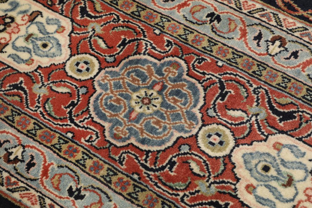 Hand-knotted Sarough rug with a central medallion and floral patterns in multicolor tones
